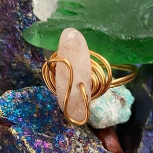 64 Milky Quartz gold toned wire wrapped ring